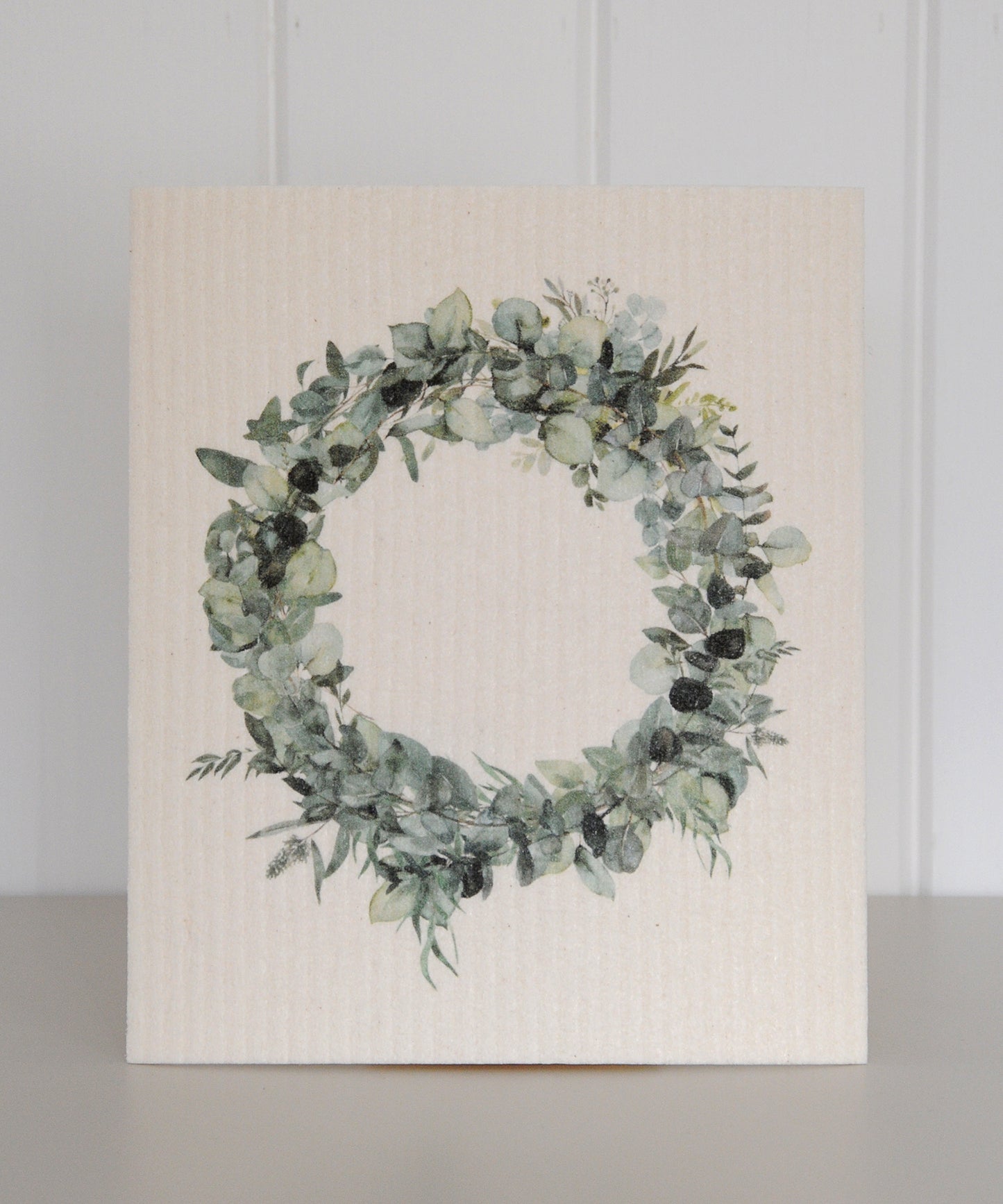 dishcloth with a green leaf wreath design