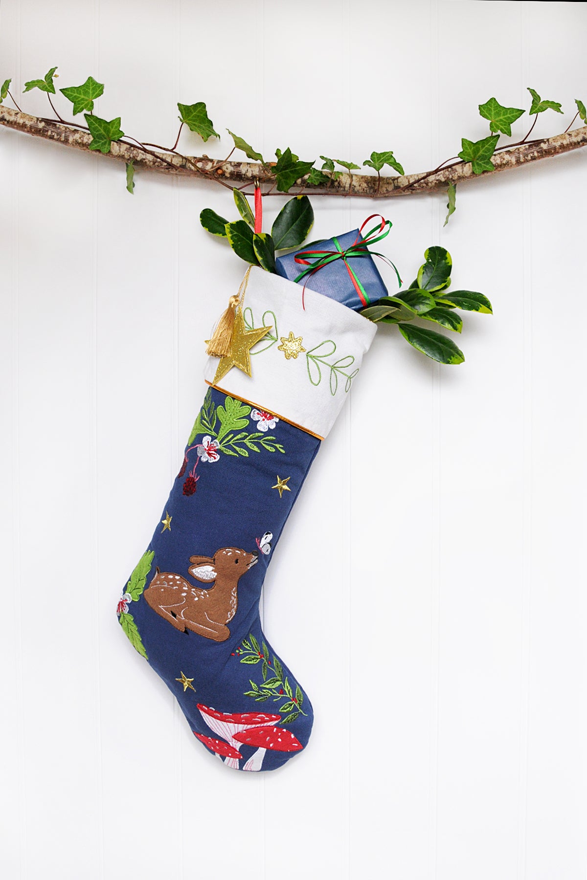 Decorative Christmas stocking with festive design on a white background